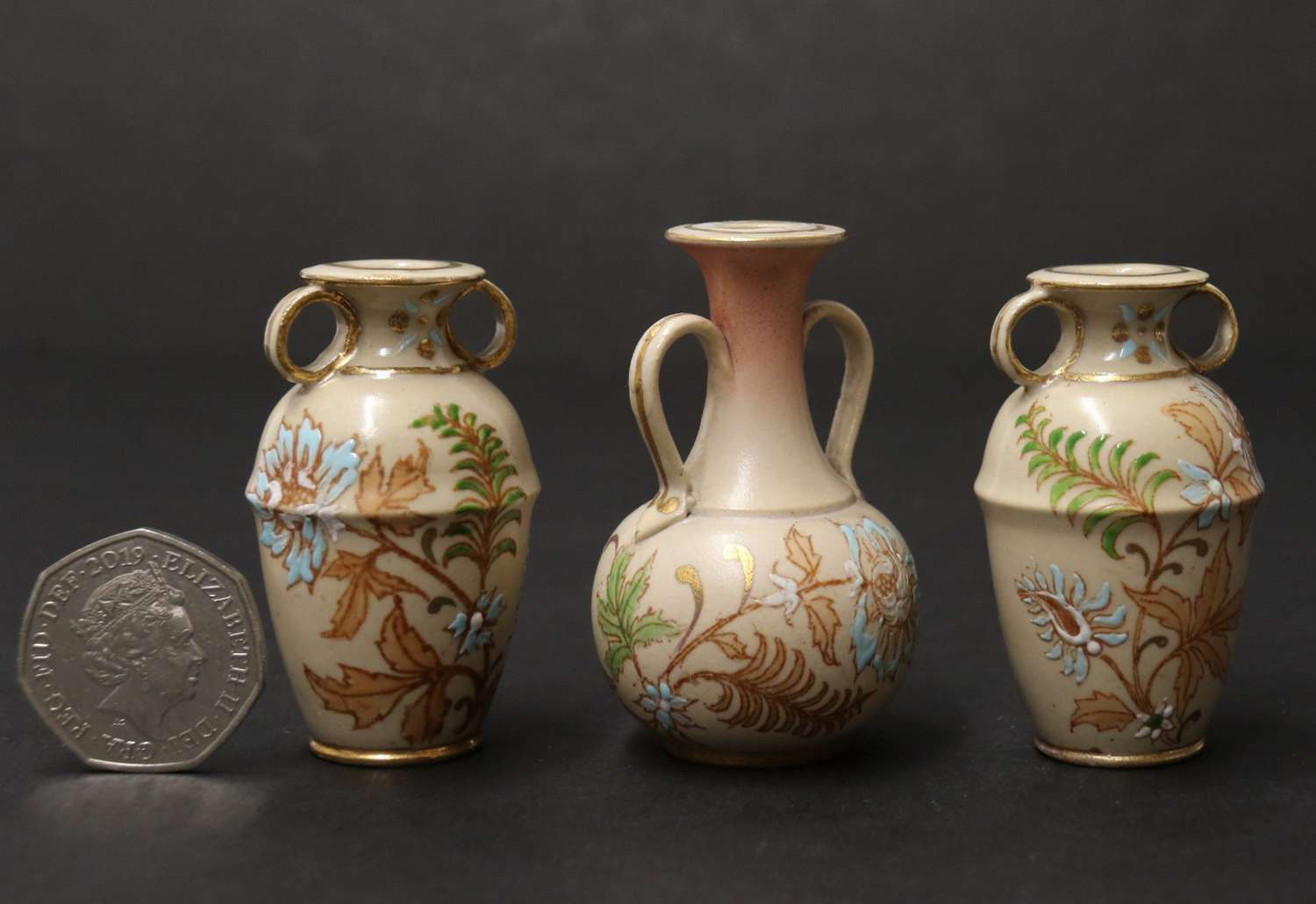 A Rare Doulton Lambeth Carrara Ware Miniature Garland Of Three Hand Painted Vases.