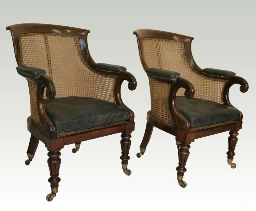 A Fine Pair Of Late Regency Carved Solid Rosewood Bergère Library Arm Chairs.
