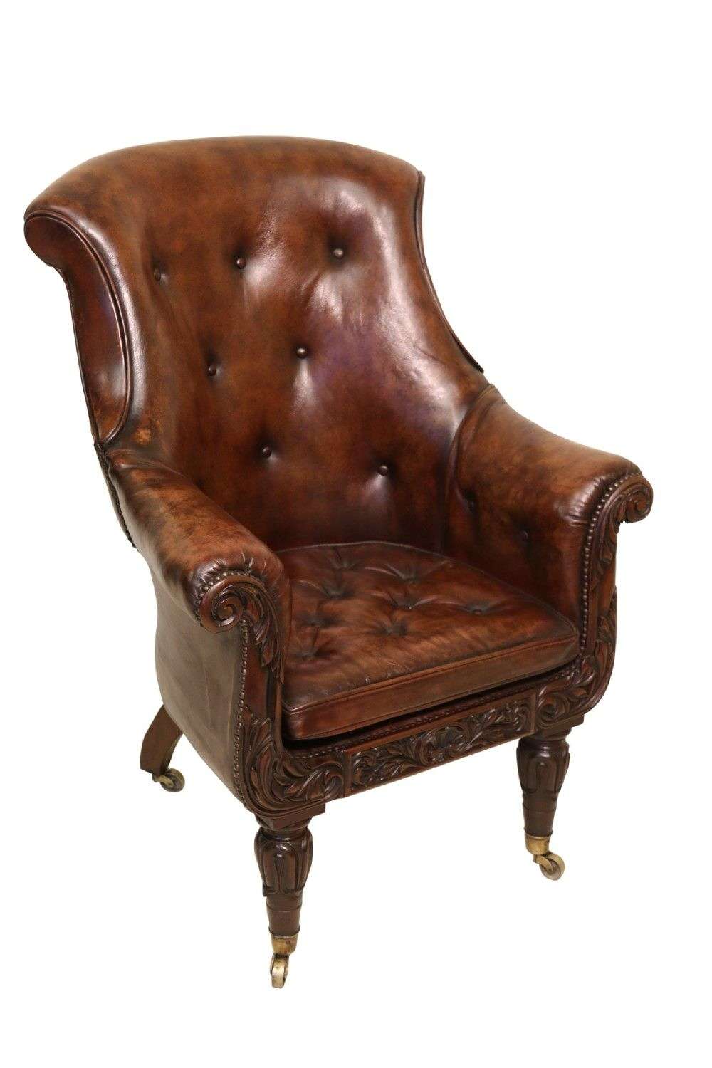 A Fine English Leather Upholstered  Late Regency Library Armchair, Cir