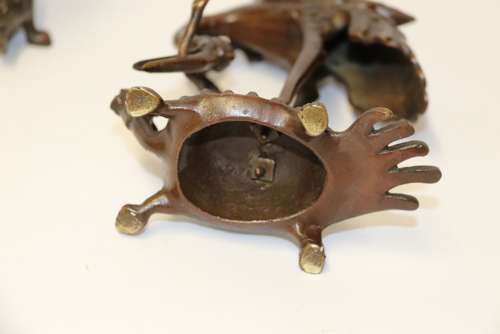 A Pair Of French Bronze Candlesticks In The Form Of Storks