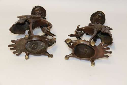A Pair Of French Bronze Candlesticks In The Form Of Storks