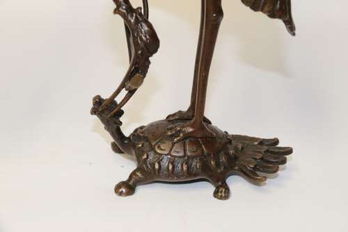 A Pair Of French Bronze Candlesticks In The Form Of Storks