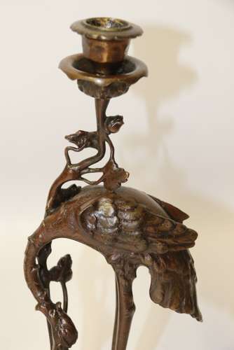 A Pair Of French Bronze Candlesticks In The Form Of Storks