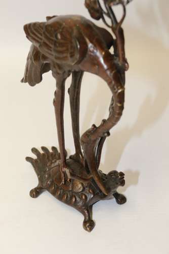 A Pair Of French Bronze Candlesticks In The Form Of Storks