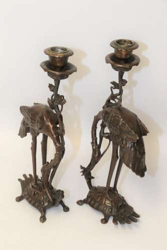 A Pair Of French Bronze Candlesticks In The Form Of Storks