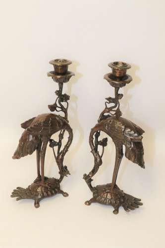 A Pair Of French Bronze Candlesticks In The Form Of Storks