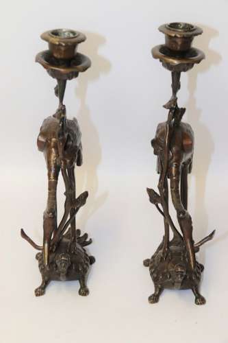 A Pair Of French Bronze Candlesticks In The Form Of Storks