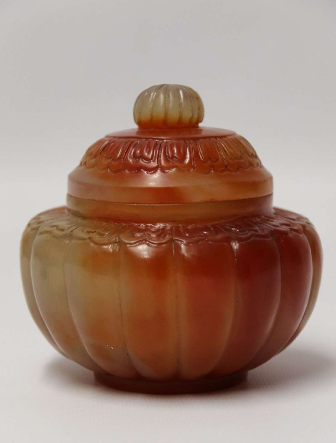 A Chinese Carved Solid Agate Jar And Cover