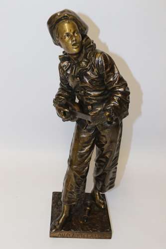 A French Bronze Sculpture Of A Pierrot Singing and playing the lute