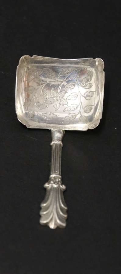 An Antique Early Victorian Silver Caddy Spoon With A Rectangular Bowl With Foliate Engraving.