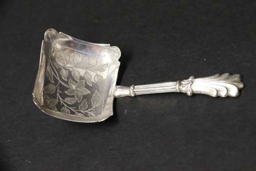An Antique Early Victorian Silver Caddy Spoon With A Rectangular Bowl With Foliate Engraving.