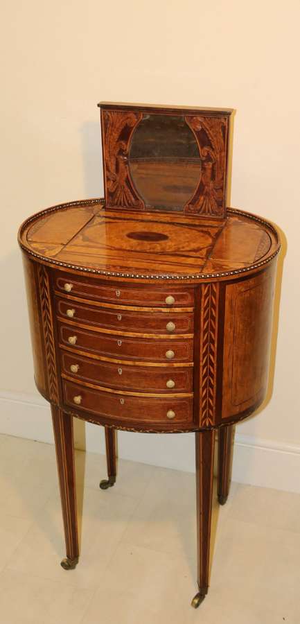 A Rare And Exquisite George III Ladies Worktable With Multiple Secret Rising Compartments.