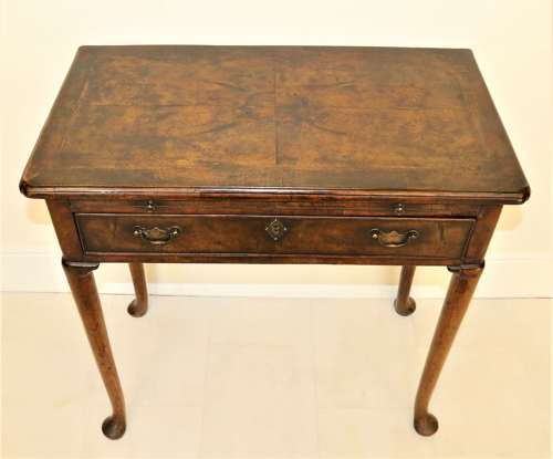A Rare Early Georgian Walnut Writing Table
