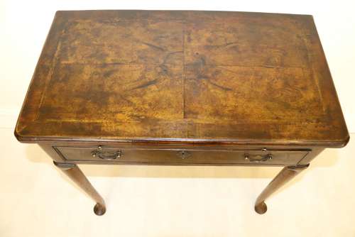 A Rare Early Georgian Walnut Writing Table