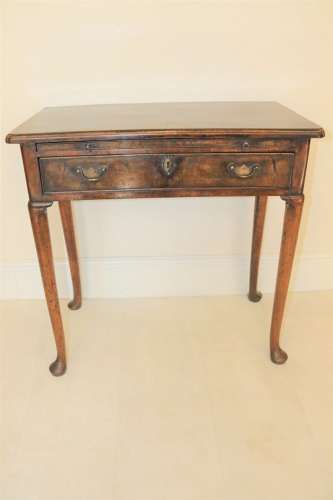 A Rare Early Georgian Walnut Writing Table