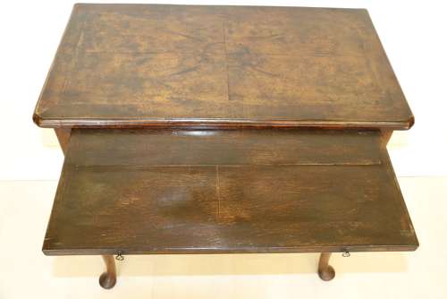 A Rare Early Georgian Walnut Writing Table