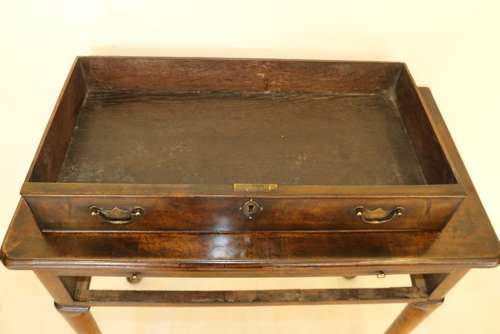 A Rare Early Georgian Walnut Writing Table