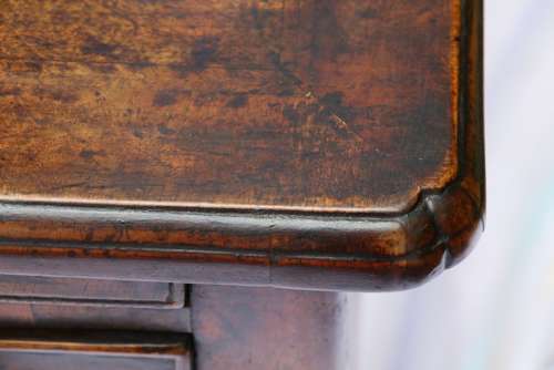 A Rare Early Georgian Walnut Writing Table