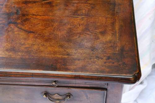 A Rare Early Georgian Walnut Writing Table