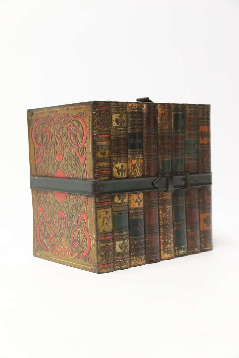 A Victorian Huntley And Palmer Biscuit Tin In The Form Of A Group Of Books