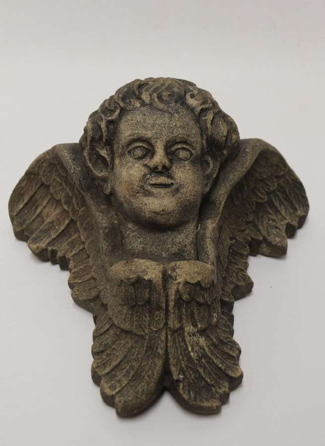 A Hand Carved Portland Stone Wall Cherub, Signed M. R Bland,1874