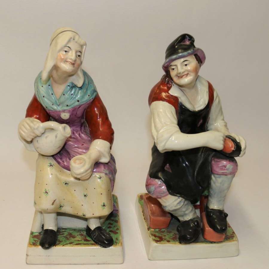 A Large Pair Of  19th C Staffordshire Pottery Seated Figures.