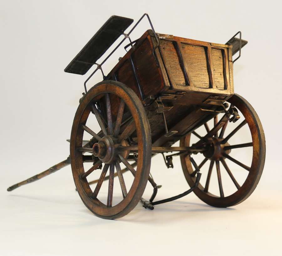 A Fine Model Of A Horse Drawn Carriage