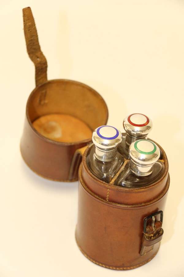 A Set Of Cased Hunting Flasks
