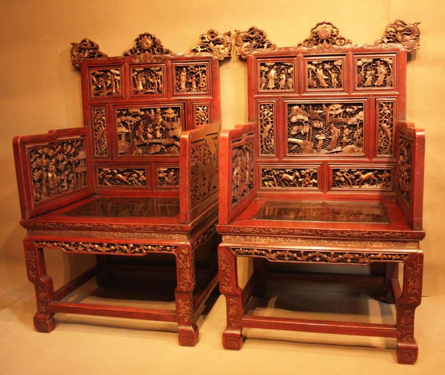 A  Highly Decorative Pair Of Chinese Throne Chairs