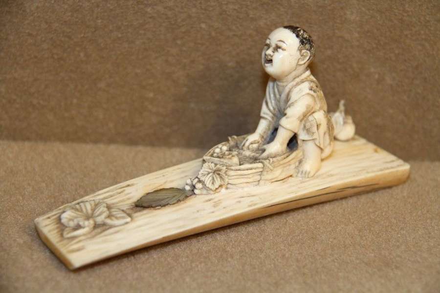 A Japanese Meiji Period Carved IVory Okimono