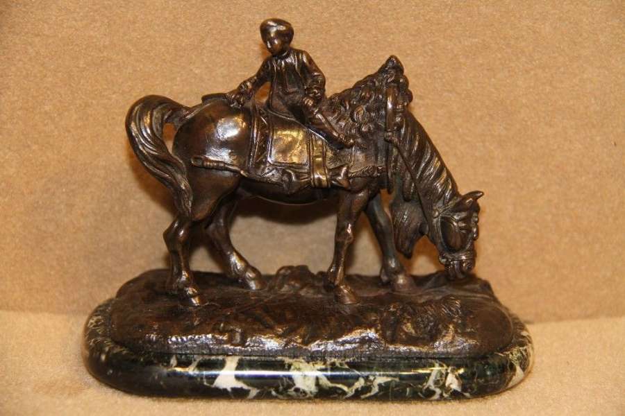 A Miniature Bronze Figure Of Carriage Horse