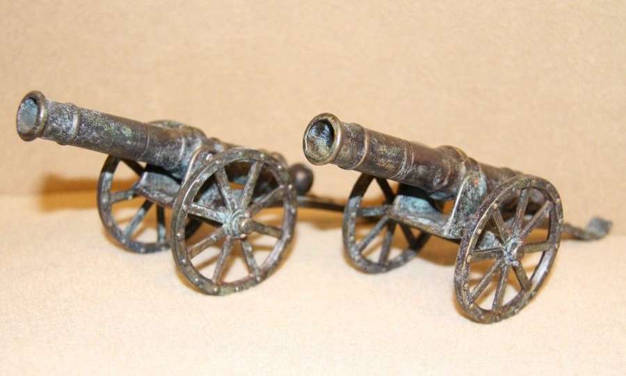 A Pair Of Bronze Cannons