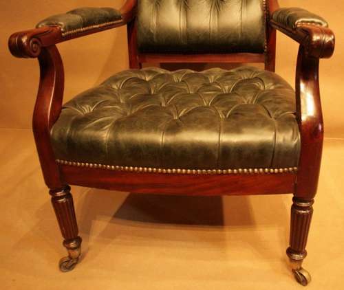 A Fine Pair Of Regency Library Chairs