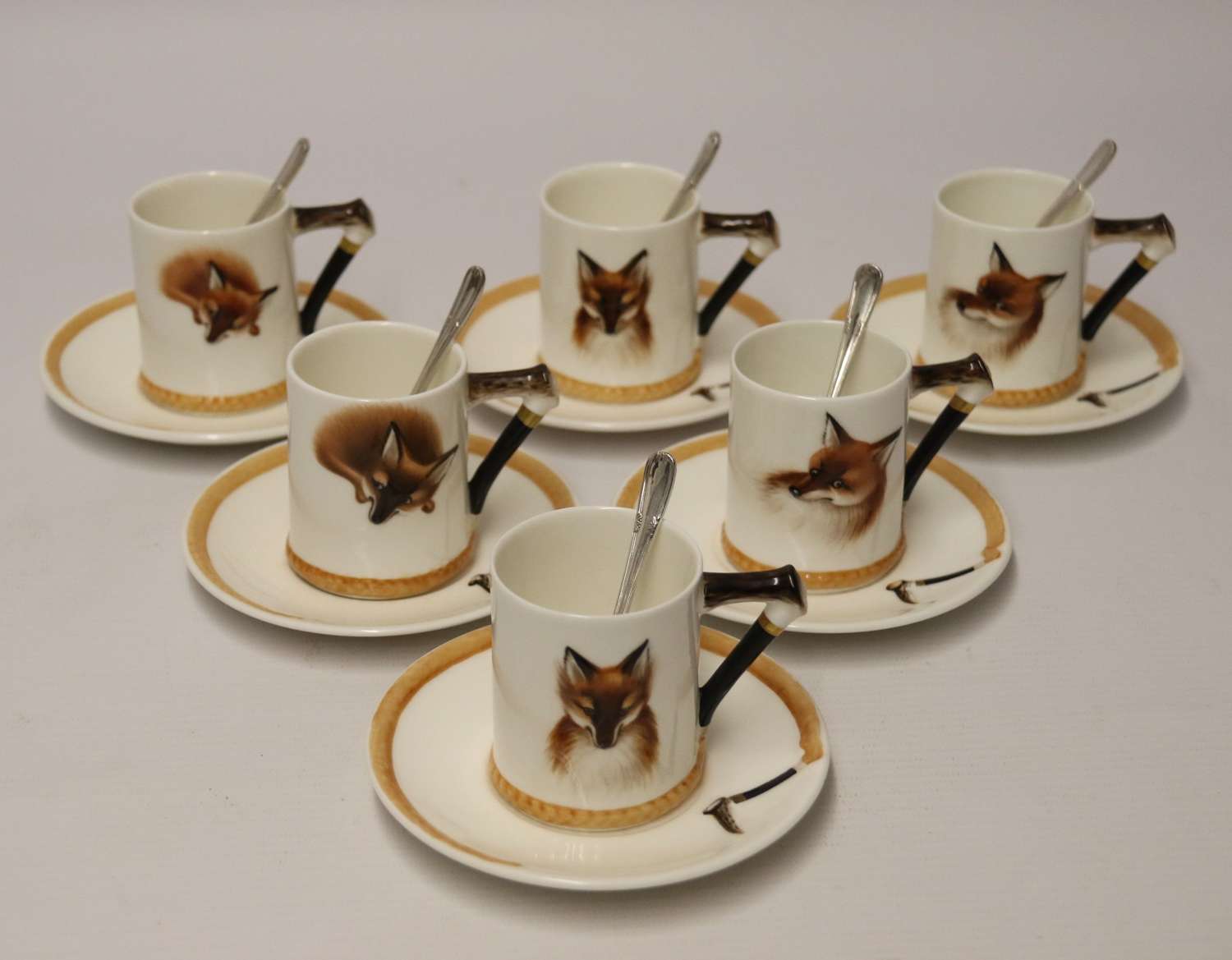 A set of six English Fox Hunting Royal Doulton Coffee Cups and Saucers