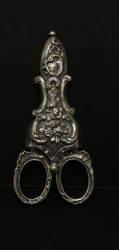 A fine pair of mid 19th C Silver scissors and sheath