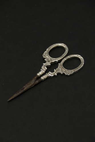 A fine pair of mid 19th C Silver scissors and sheath