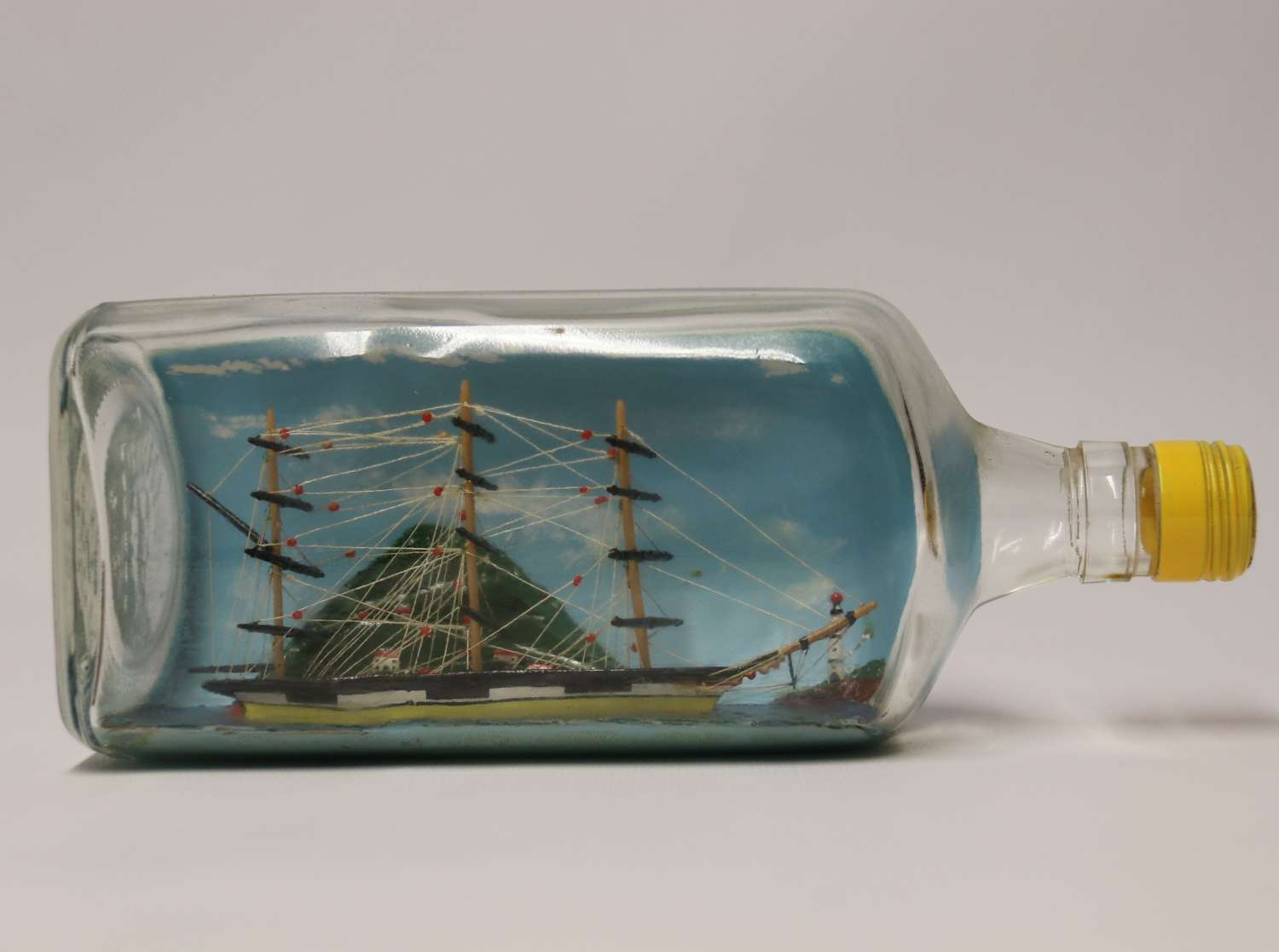A Fine Diorama folk art model ship in a bottle