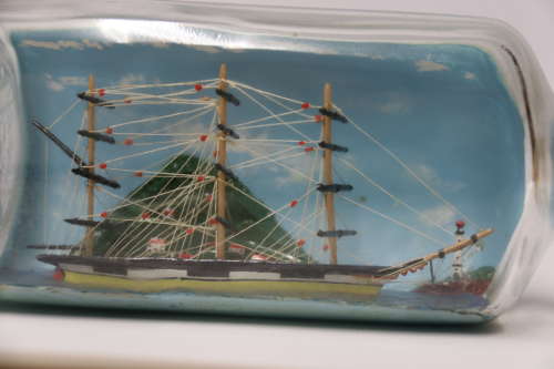 A Fine Diorama folk art model ship in a bottle