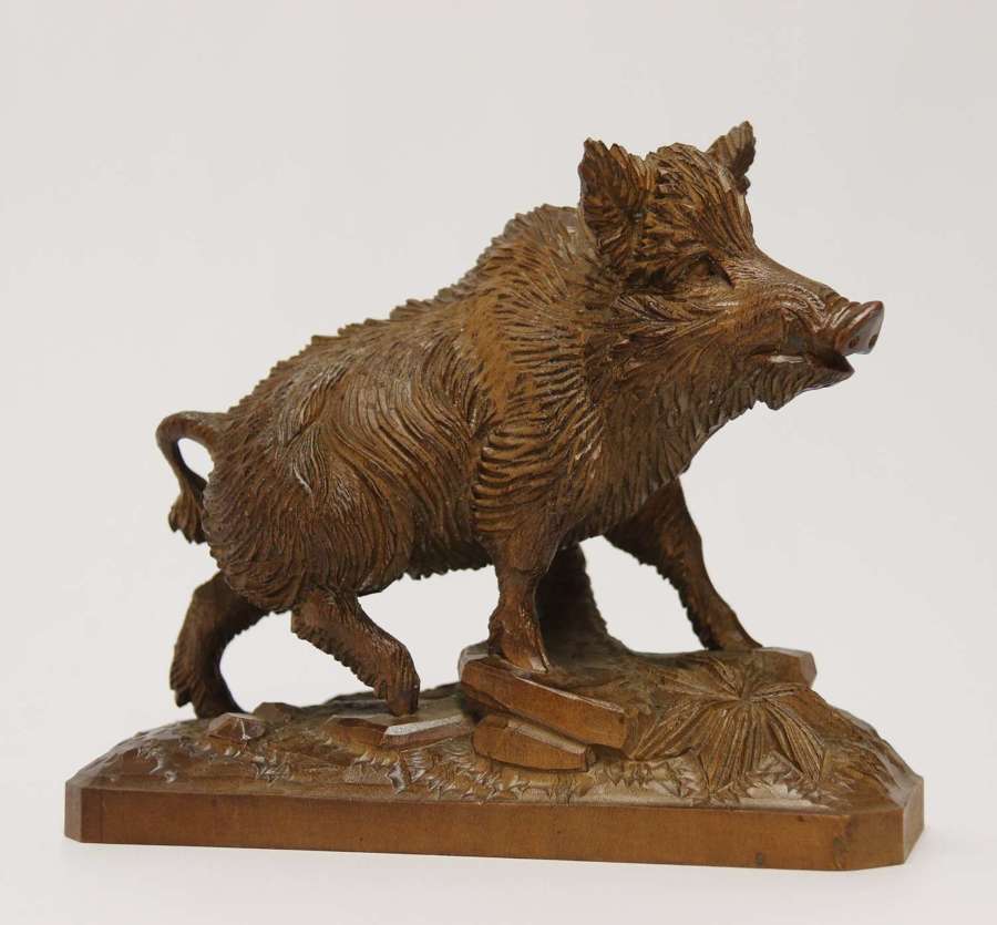 A fine Black Forest limewood carved study of a boar, Circa 1870