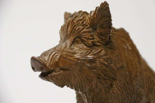 A fine Black Forest limewood carved study of a boar, Circa 1870