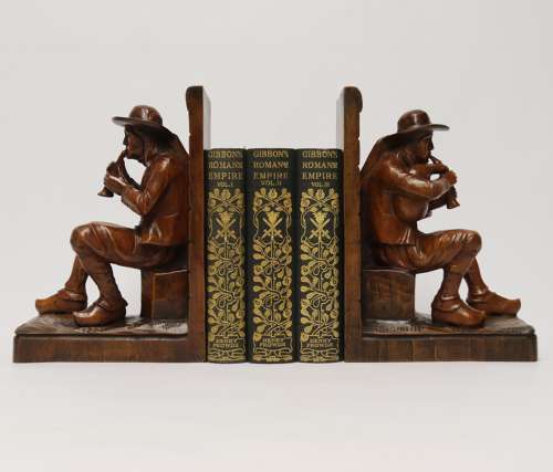 A fine pair of Black Forest carved walnut bookends, circa 1900