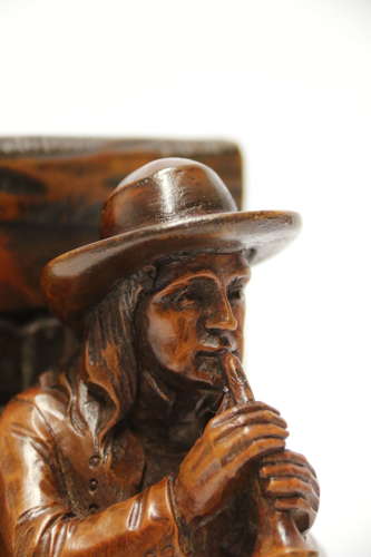 A fine pair of Black Forest carved walnut bookends, circa 1900
