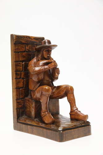 A fine pair of Black Forest carved walnut bookends, circa 1900