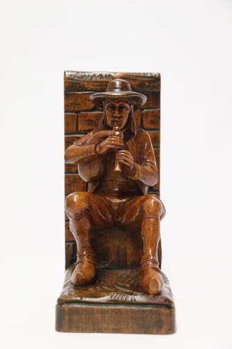 A fine pair of Black Forest carved walnut bookends, circa 1900