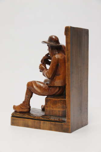 A fine pair of Black Forest carved walnut bookends, circa 1900