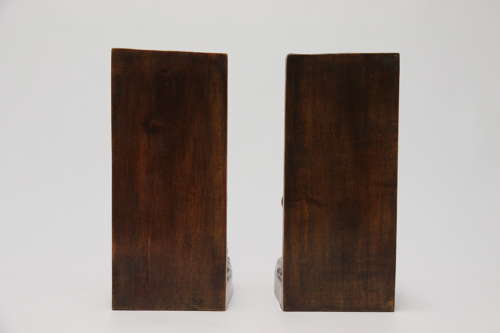 A fine pair of Black Forest carved walnut bookends, circa 1900