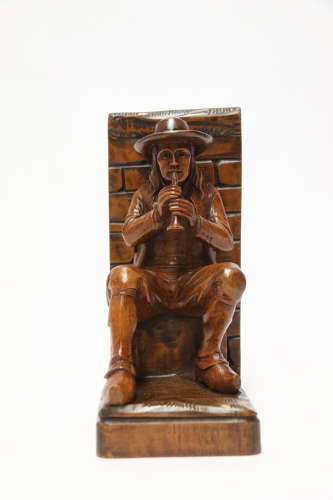 A fine pair of Black Forest carved walnut bookends, circa 1900
