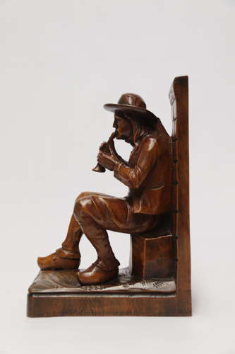 A fine pair of Black Forest carved walnut bookends, circa 1900