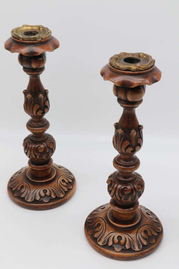 English 19th century carved walnut and brass mounted candlesticks