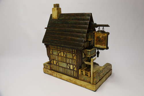 Folk art hotel post box in the form of a half timbered inn, circa 1930